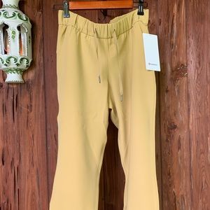 Lululemon On the Fly Crop Woven Mustard Yellow